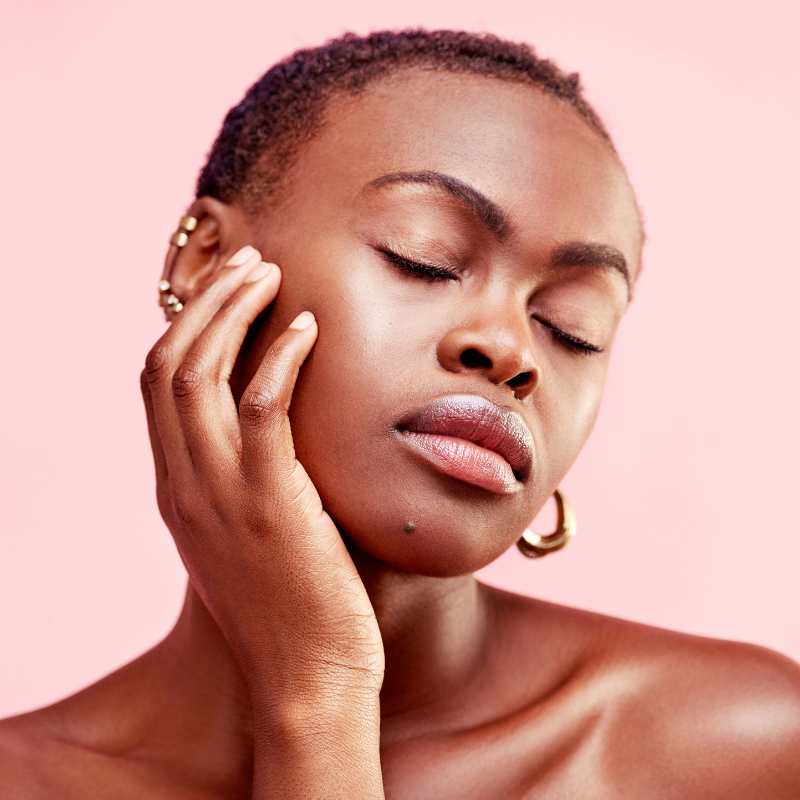 beauty grid 2 Lady touches her face