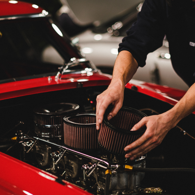 automotive grid 1 hands adjusting car part