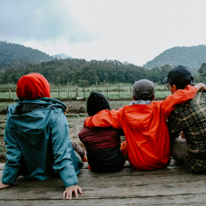 family sat outdoors